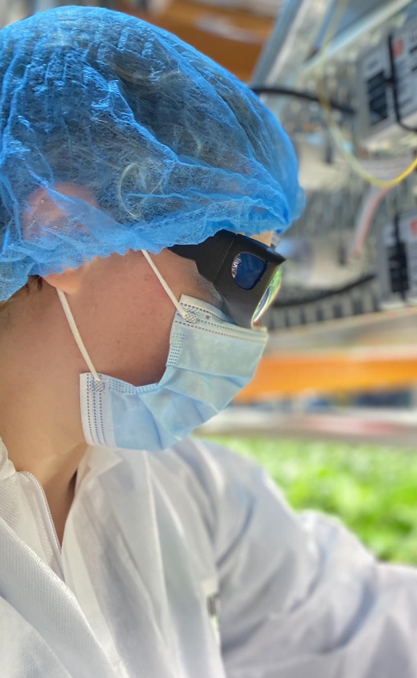 Phyllome agronomist managing crops in a controlled-environment facility